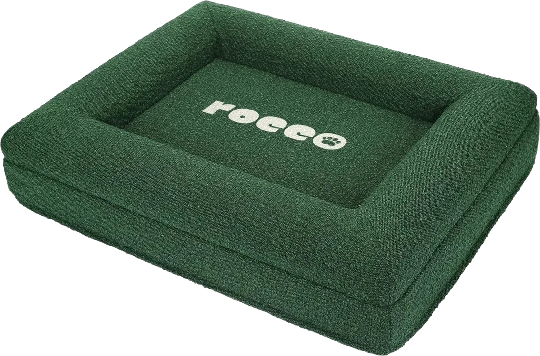 The Bolster Bed in forest green boucle